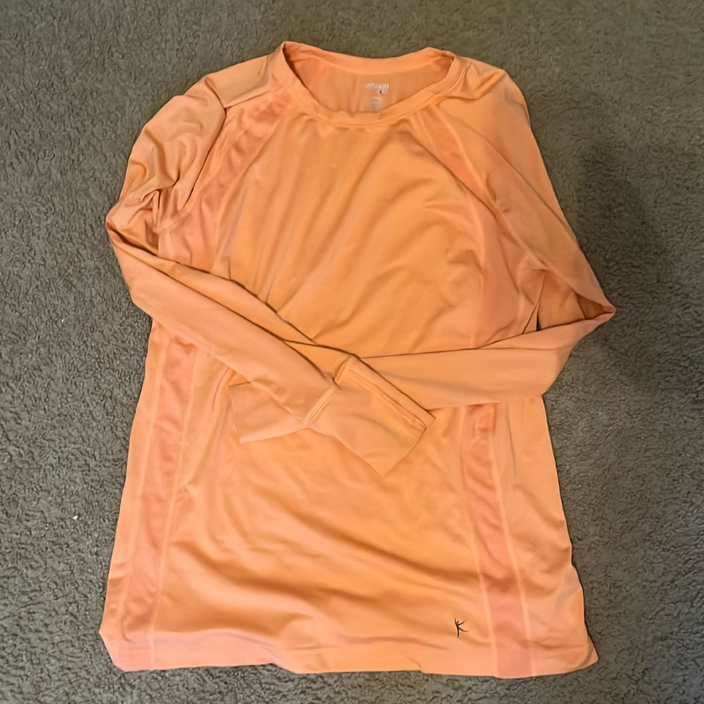 Orange long sleeve workout top